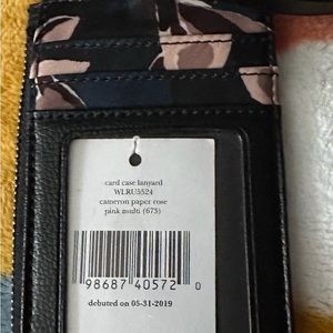 Kate Spade ID Holder with Multiple pockets.